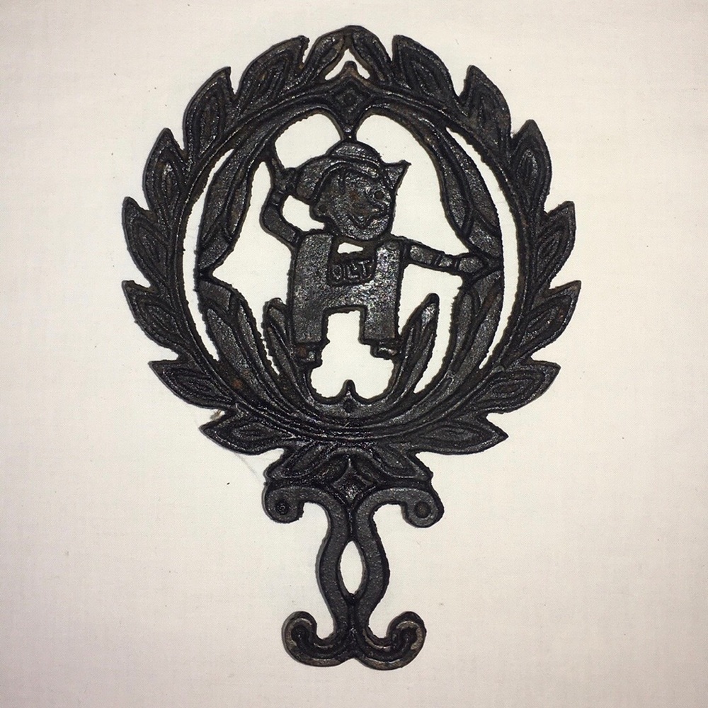 Vintage Holt Cast Iron Trivet
